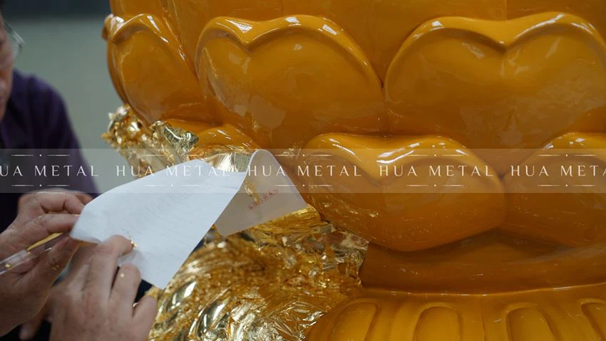 Covering with 24 kt gold leaf