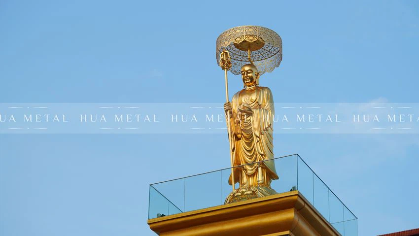 Gold leaf Buddha statue completion