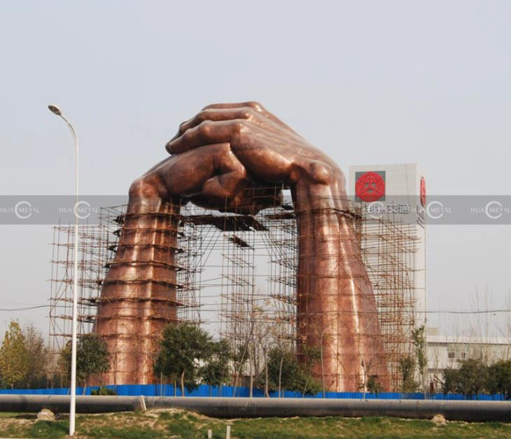 bronze-monument-sculpture-enormous-hand-statue-forging-bronze